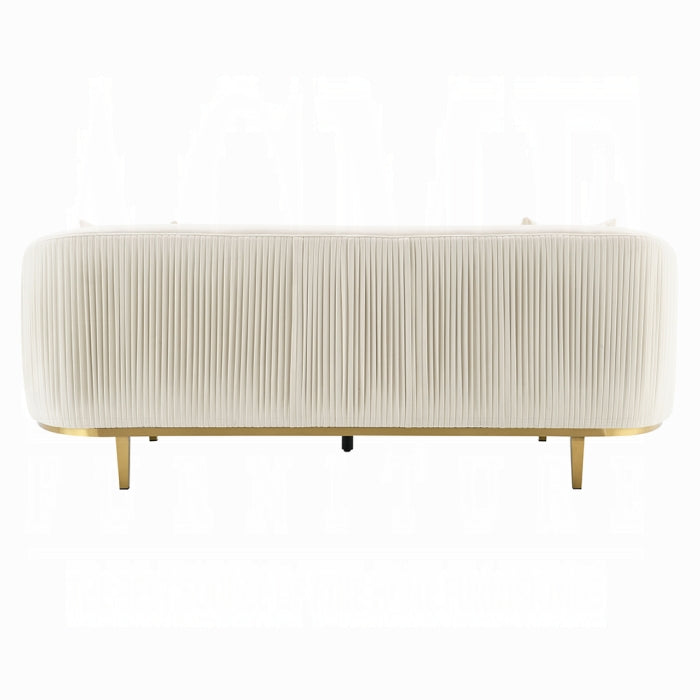 Sofá Martina beige con dorado